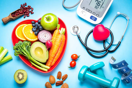 Heart-shaped plate with healthy fruits and vegetables, stethoscope, blood pressure monitor, dumbbell, and measuring tape symbolizing immunity and health.
