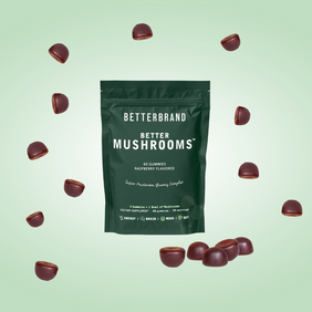 Betterbrand Better Mushrooms raspberry-flavored gummy supplements with scattered gummies around the package