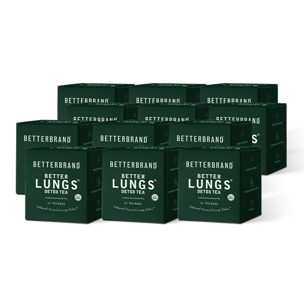 Six dark-green retail product boxes stacked in two rows;front labels not legible