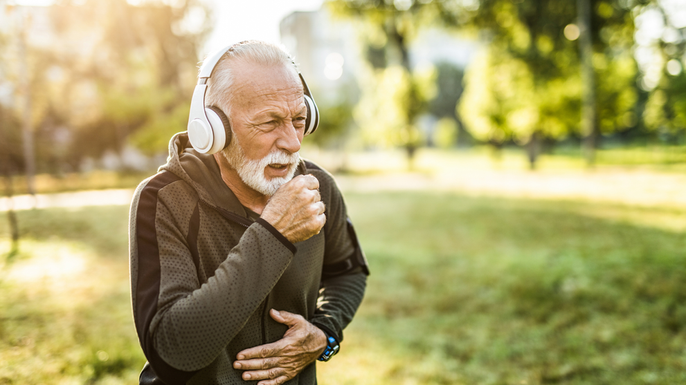Senior coughing