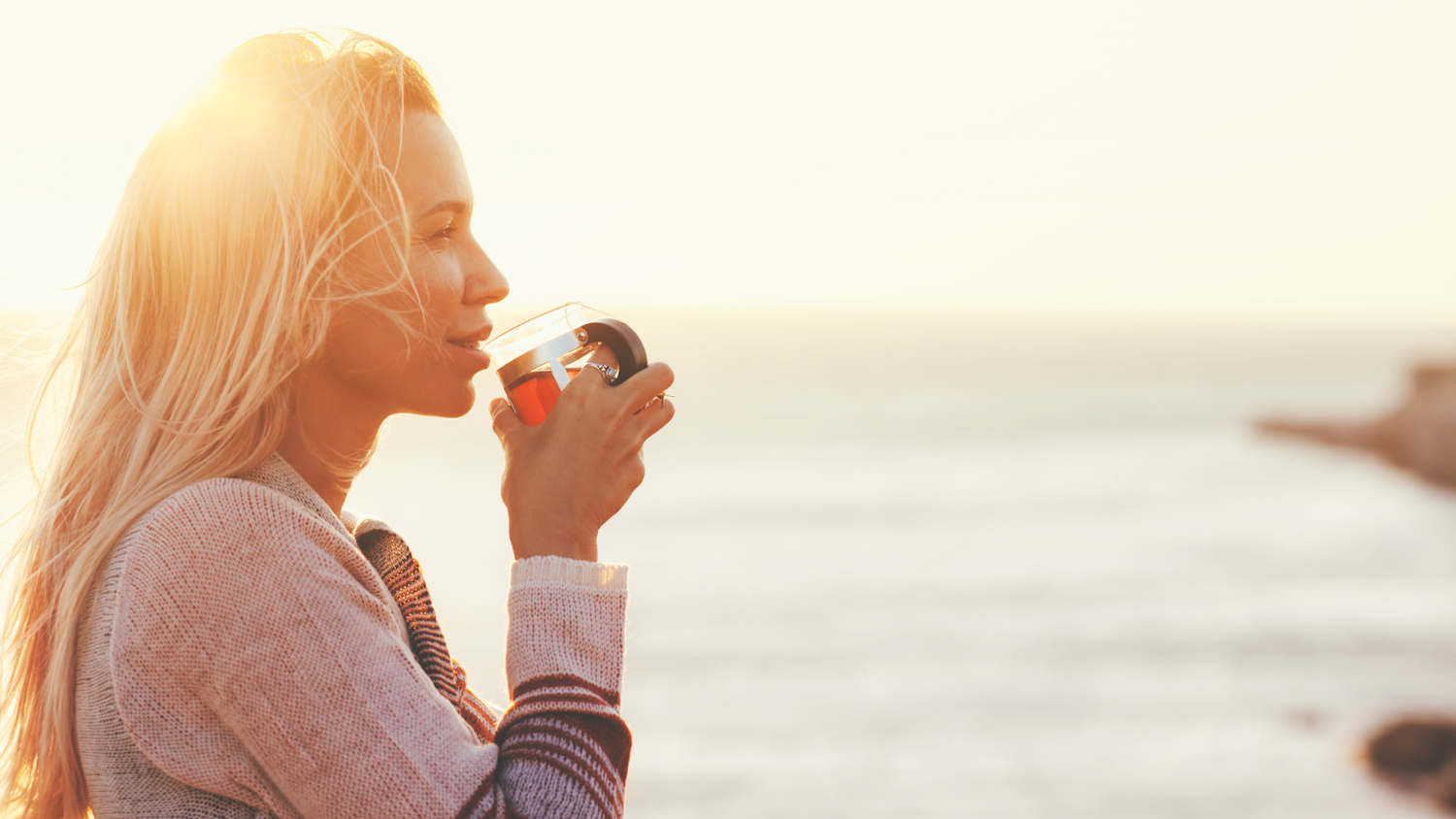 Woman Drinking Tea Outdoors