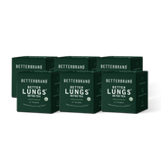 Three green product boxes with white logos and text arranged side-by-side